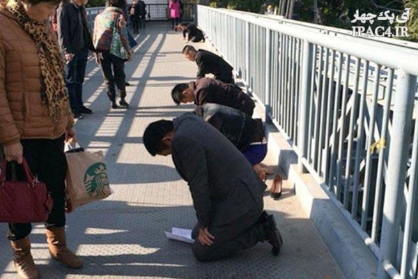 Funny-way-to-punish-Chinese-staff-photos-irannaz-com